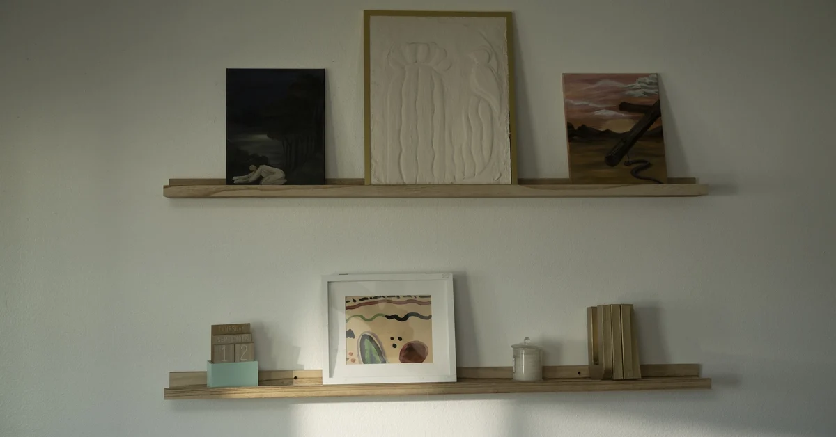 Picture ledges used to house artwork, including unframed ones.