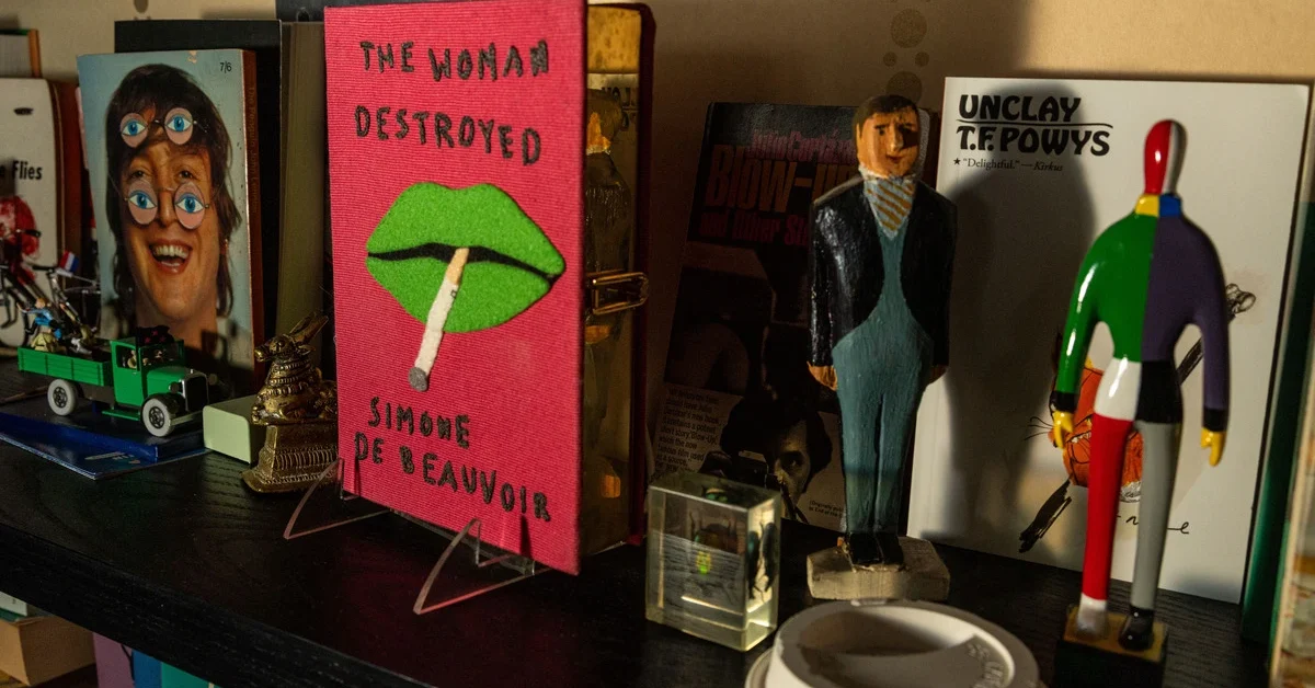 Peter Mendelsund's book cover designs are displayed on his bookshelves on Friday, May 9, 2025 in New York, NY.